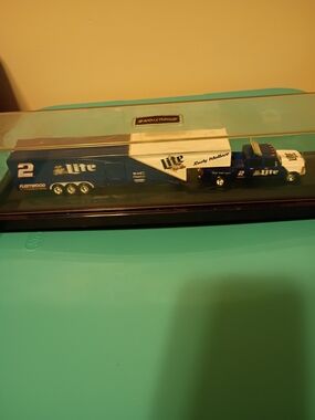 Lite-Branded Blue and White Transporter Truck Collectible